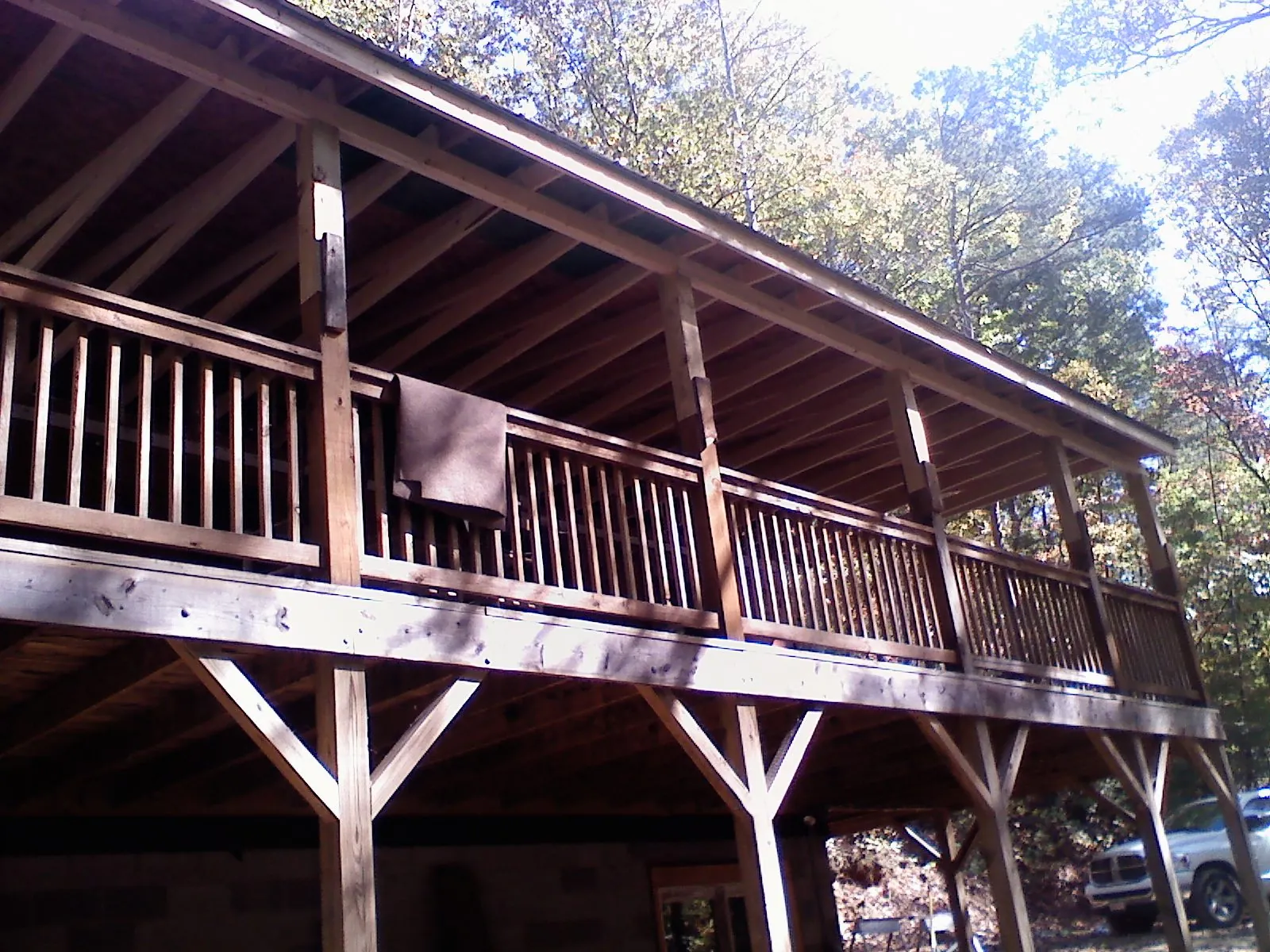 Timber framing under a new elevated porch and deck — Roof Leak Repair in Statesville by Roofing Brothers